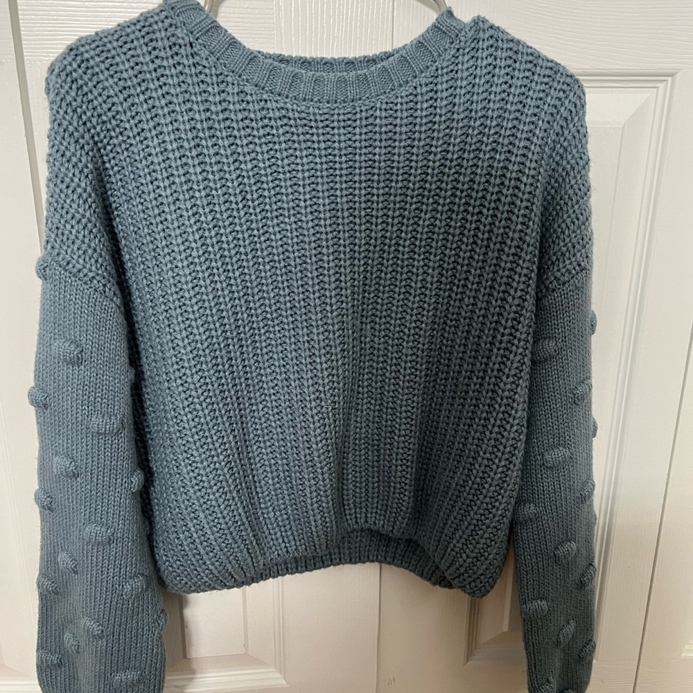 Blue knitted sweater